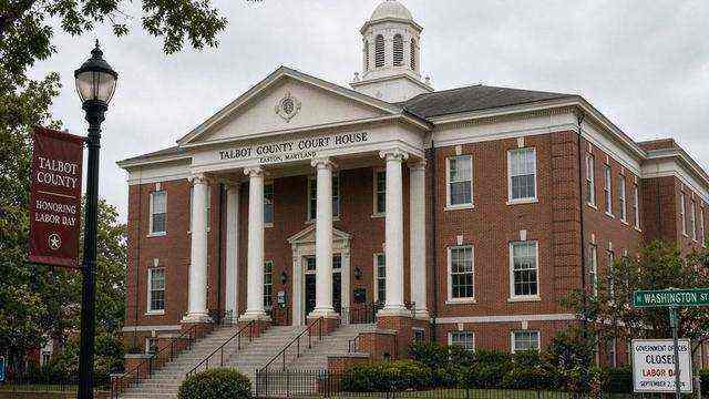 County office doors with Labor Day holiday notice