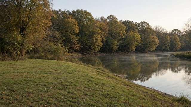 Small grassy riverbank lot beside a quiet tidal river on Maryland's Eastern Shore
