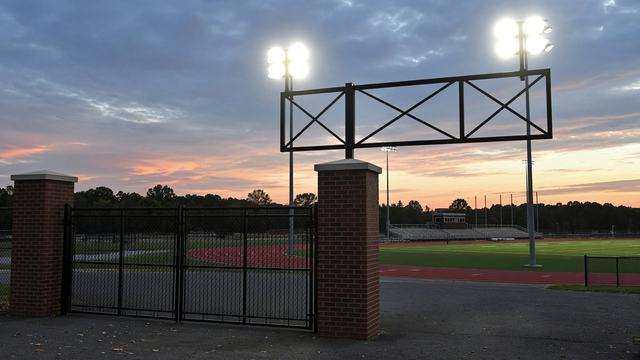 High school stadium lights and weekday athletics gates
