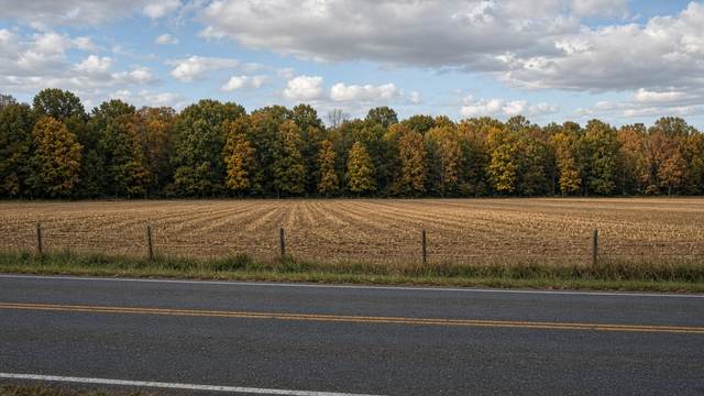 Open farm field along a state highway corridor